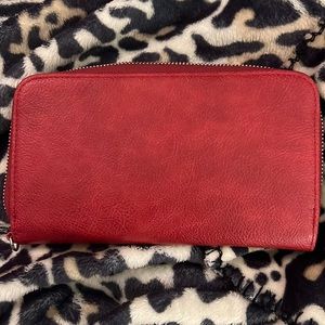 Red wallet with detachable wristlet